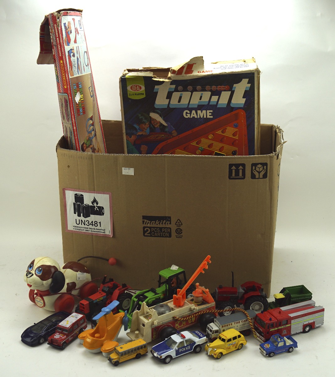 A collection of assorted vintage toys, to include die cast model vehicles,