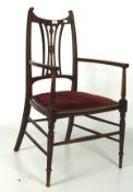 A 19th century mahogany chair with inlaid details, pierced back splatt,