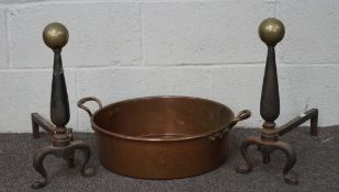 A pair of late 19th/early 20th century fire dogs and a large copper pan,