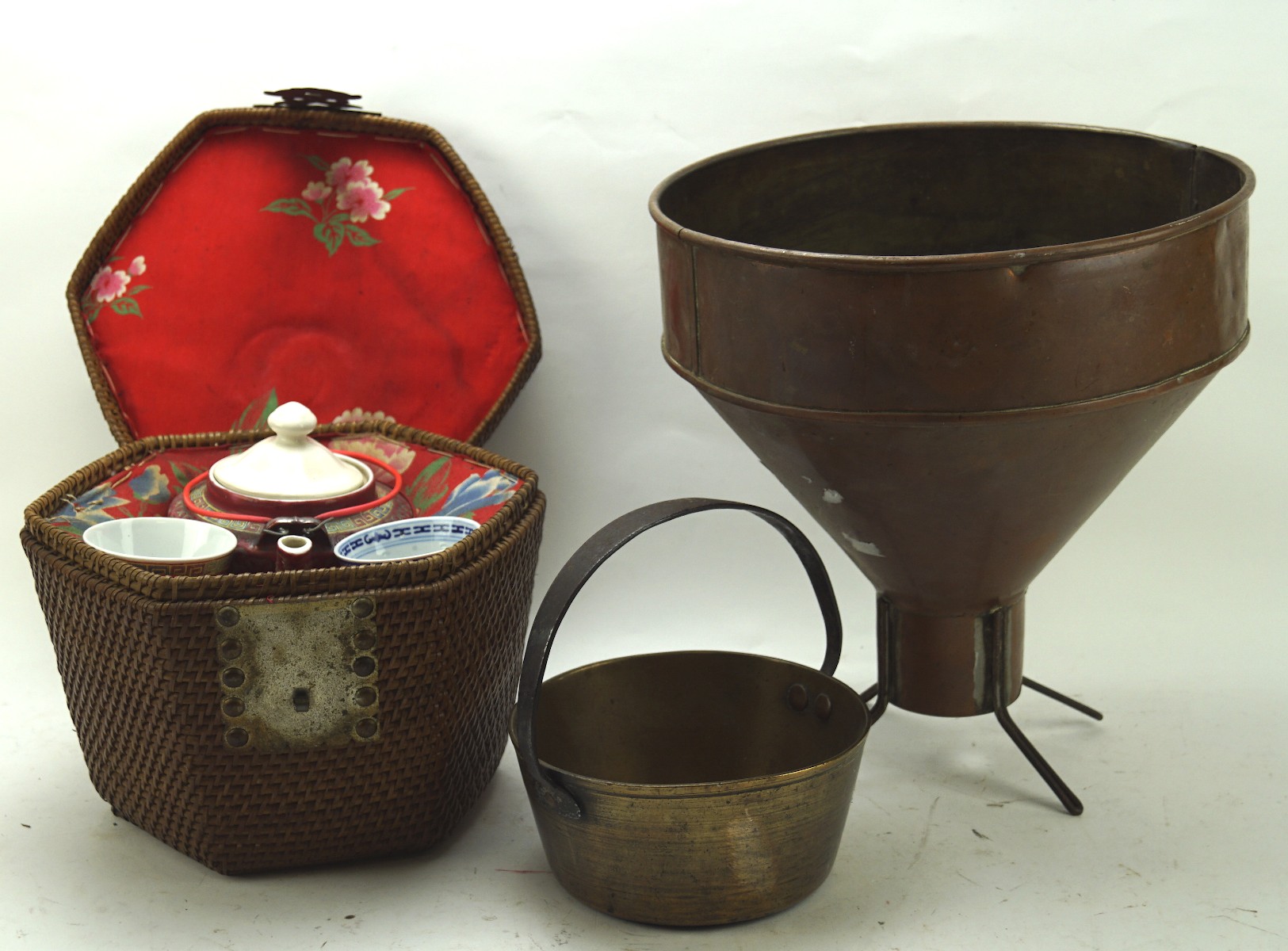 A cased Chinese teapot and two cups and items of metalware,