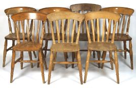 Seven pine kitchen chairs, of assorted designs,