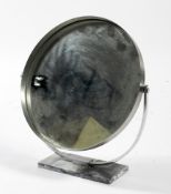 A Durlston Design chrome framed circular dressing table mirror,