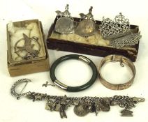 A collection of silver and white metal jewellery and related wares,