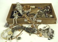 An assortment of vintage costume jewellery, to include dress rings, bangles,