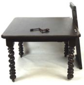 A late 19th century oak extending dining table, with single additional leaf and winding handle,