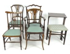 Four mahogany chairs with crossgrain details, an occasional table and a stool,