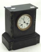 A 20th century mantle clock, the white dial with Roman numerals,