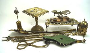 A collection of 19th and 20th century brassware, including fire tools, a set of scales,