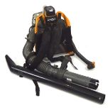 A Ryobi petrol backpack leaf blower,