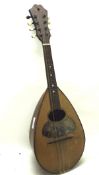 An early 20th century Italian mandolin, with a label to the inside reading 'F De Mureda, Napoli',