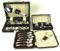 A mid century silver condiment set and two boxed cutlery sets,