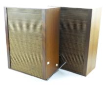 A pair of vintage tabletop speakers, each housed in wooden case with slatted front, each 47.