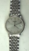 A vintage gents Tissot Quartz wristwatch, the silvered dial with batons denoting hours,