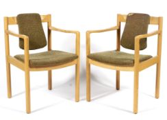 A pair of Ercol beech 775A model chairs.