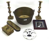 A collection of brassware, including a pair of candlesticks, a hinged box,