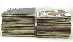A large collection of vintage vinyl records and albums,