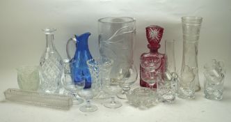 A collection of glassware, including decanters, wine and spirit glasses, jugs,