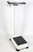 A set of vintage Weylux adult weighing scales, 10kg x 50g, max weight 160kg,