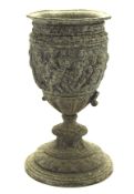 An unusual cast metal goblet