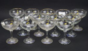 A collection of 13 vintage Babycham glasses,