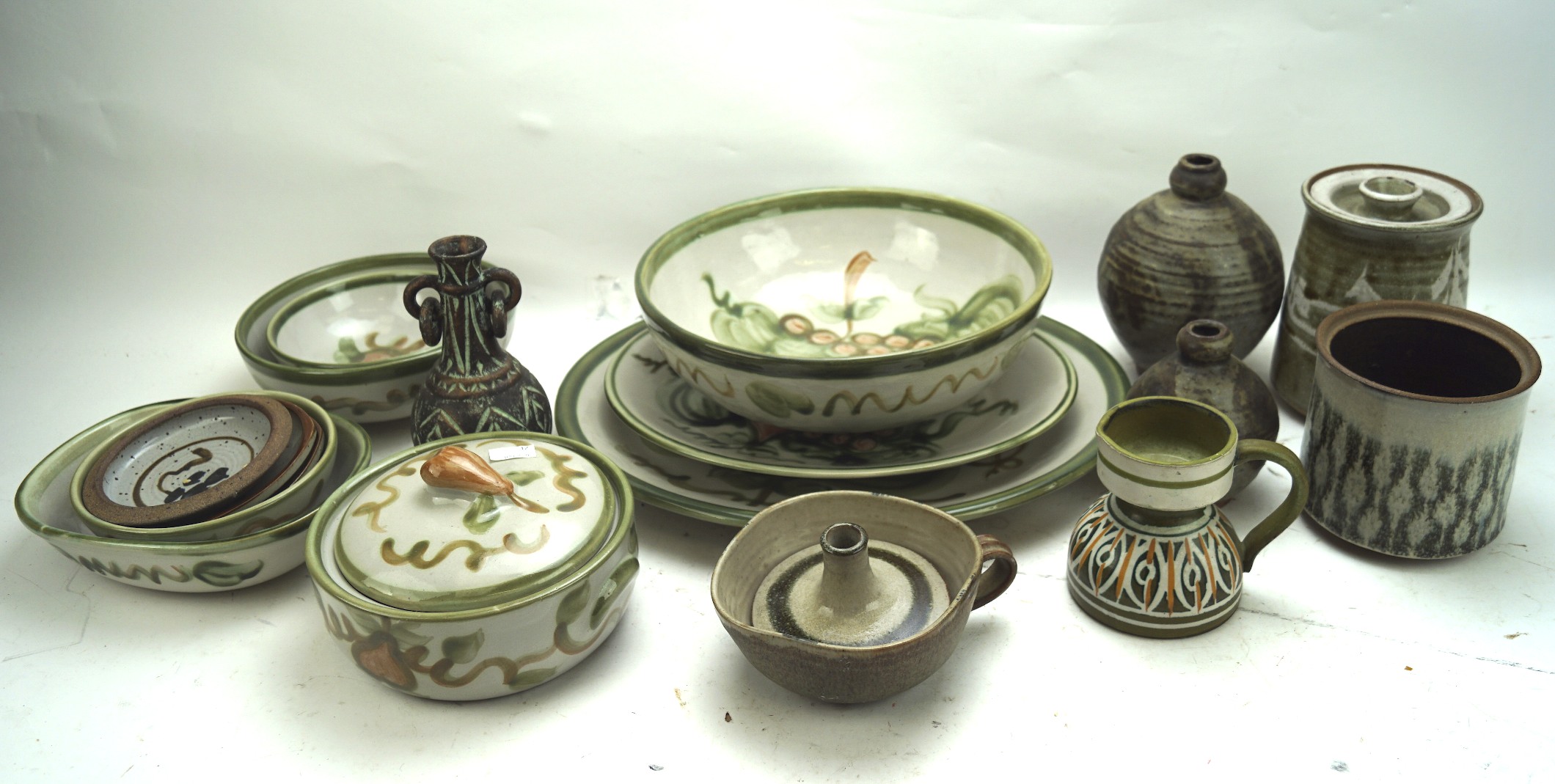 A collection of studio pottery, including vases and tureens,