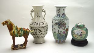 Four items of Chinese ceramics, including two vases, one glazed in white with pierced decoration,