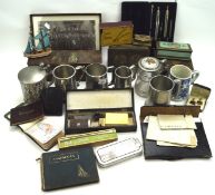 An assortment of 20th century collectables, including tankards, autograph books, photo albums,