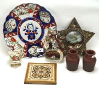 A collection of 19th and 20th century ceramics, including an Imari dish with fluted edges,