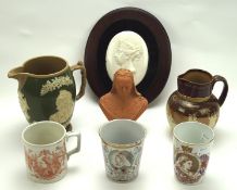 An assortment of commemorative ceramics and metalware,