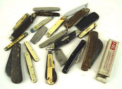 A selection of pocket knifes and razors, of assorted sizes,