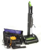 A Dyson D130 and a G. Tech Air Ram hoover