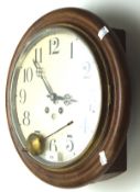 An early 20th century mahogany wall clock by the Ansonia clock company,