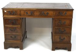 A reproduction Georgian style mahogany twin pedestal desk,