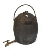 A large 19th century cast iron T&C Clarke Co 8 gallon pressure cooker,