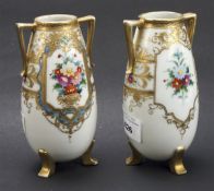 A pair of Noritake twin handled vases, both with two cartouches to either side,