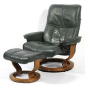 A 'Stressless' style green leather finish reclining armchair with matching footstool.