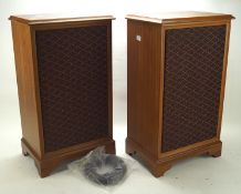 A pair of wooden cased speakers, each with burr wood veneer to top,