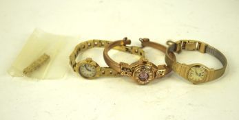 A group of three vintage ladies cocktail watches, one being by Lewa with hinged dial cover,