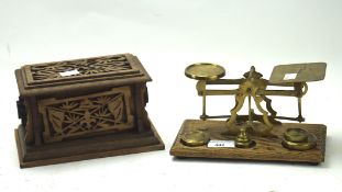 A set of brass scales and a wooden 'Scouts' box,