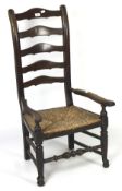A 19th century carver chair, the mahogany frame with pierced splats and bobbin turned supports,