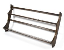 An Ercol hanging plate rack, 96cm wide.