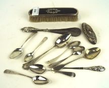 An assortment of silver wares, including Georgian teaspoons,