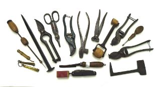 A collection of vintage tools, including pliers,