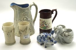 A collection of 20th century ceramics, including a pair of vases decorated with vines, two jugs,