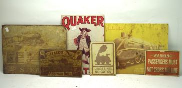 A selection of contemporary enamel and metal advertising signs, including one for 'Quaker Oats',