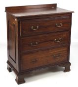 A 19th century mahogany chest of drawers, three shelves with metal handles, on raised supports,