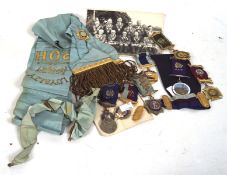 A collection of Masonic regalia, to include three hallmarked silver jewels, each with ribbons.