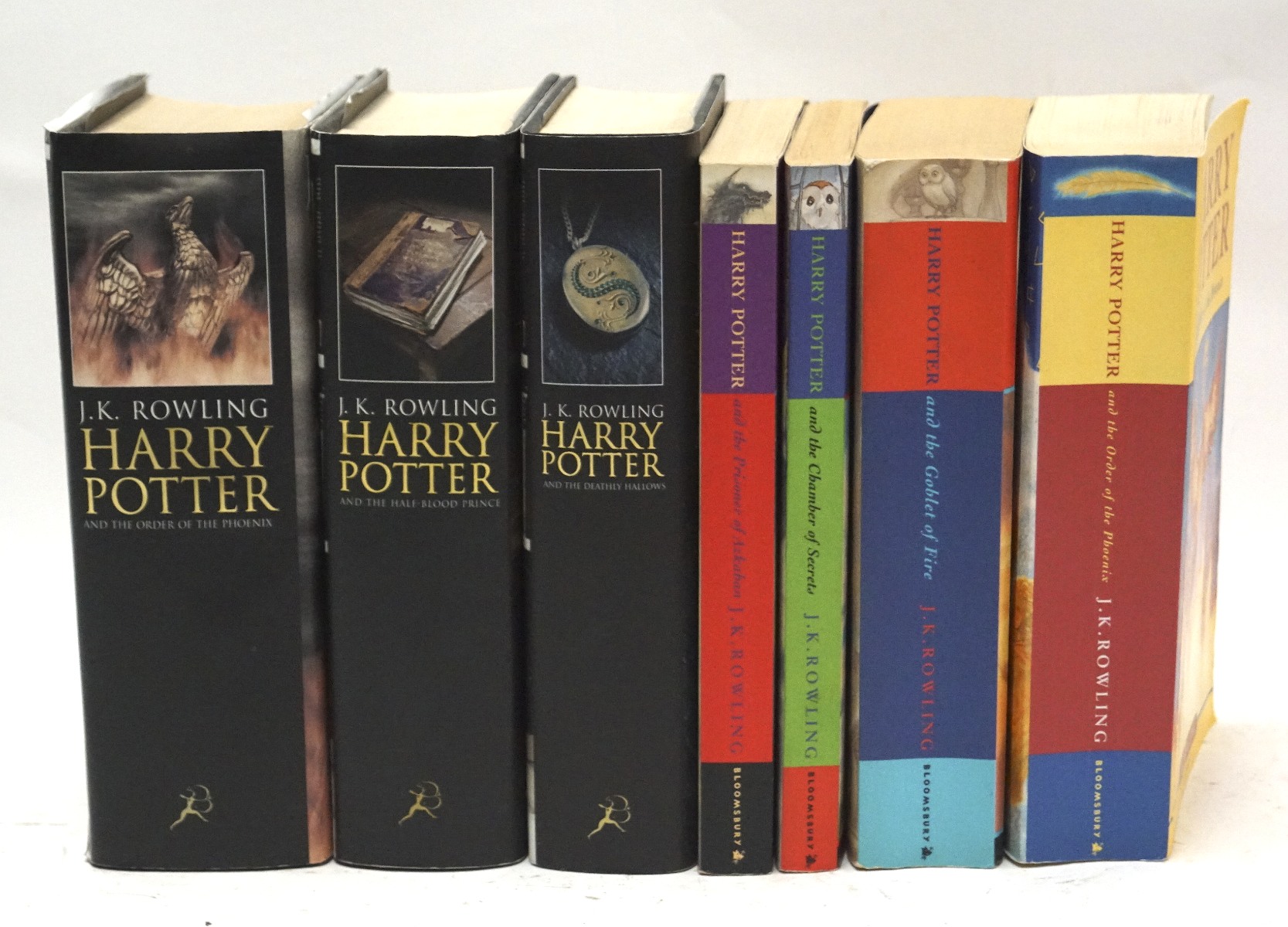 A collection of Harry Potter books, including 'The Goblet of Fire', 'The Half Blood Prince',