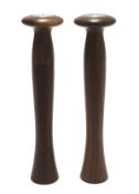 A pair of Alessi salt and pepper grinders, both constructed of turned teak wood, height 29.