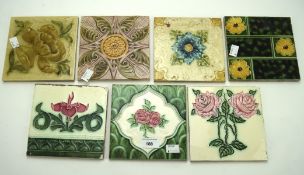 A selection of seven ceramic tiles, each depicting a floral scene, various manufacturers,